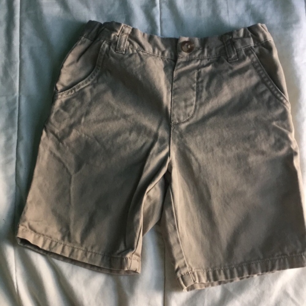 3 boy shorts, 1 swim trunks and Nike shirt.